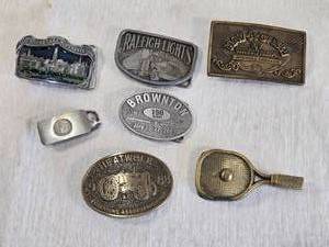 lot 261 image: Belt Buckles and Accessories such as Raleigh Lights, Hava Tampa, and Heatwole Threshing Association, Browntons 150th anniversary and Silver Lake, Minnesota