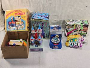 lot 276 image: Vintage Toys Including Gingerbread Whistling Express, Plastic Castle Bank, Wind Up UFO Savings Bank and Beetlejuice Gross Out Meter