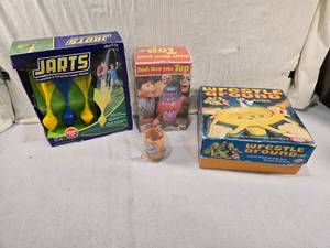 lot 278 image: Jarts, Dont Blow Your Top, and Wrestle Around, Dice Cup