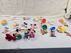lot 284 image: Lot of Disney-Themed Baby Mobiles