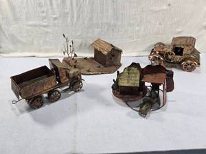 lot 296 image: Vintage Metal Copper Music Boxes including dump truck (works delicately) and car, alongside miniature structures like a small building and landscape element - Some May Need WorkRepair