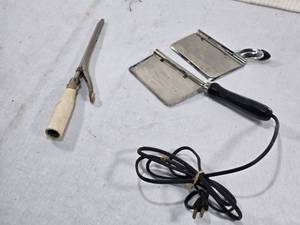 lot 312 image: Vintage Curling Iron and Electric Hair Clipper