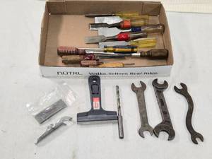 lot 323 image: Vintage Wrenches (International Harvester x1), Wood Chisels, Sharpening Stone that says Firestone