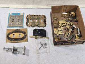lot 329 image: Decorative Switch Plates and Door Hardware