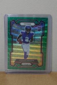 lot 30 image: 2023 Panini Prizm Jordan Addison Green Wave Parallel Rookie Football Card