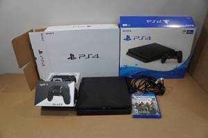 lot 88 image: Sony PlayStation 4 with Game and Controller