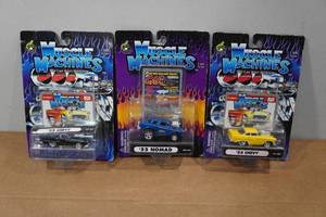 lot 156 image: 3 Muscle Machines 164 Scale Replicas - 55 Chevy & Nomad