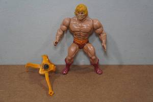 lot 185 image: Vintage 1981 Masters of the Universe He-Man Action Figure and Chest Shield