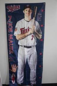 lot 223 image: 4 Minnesota Twins Joe Mauer Life Sized Nylon Growth Charts - Game Giveaways