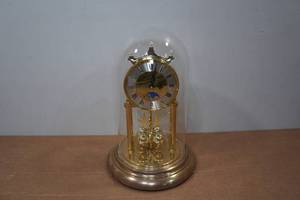 lot 324 image: Bulova Glass Dome Mantle Clock Made in Germany