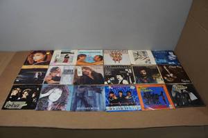 lot 366 image: 45 Vinyl Records - Photo Jacket - Abdul, Cher, Bon Jovi