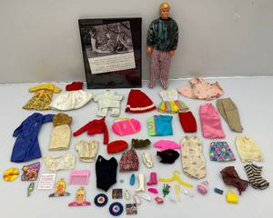 lot 47 image: Misc. Vintage Barbie Items Including KEN Doll,. Framed Picture And Cloths