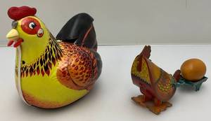 lot 70 image: Misc. Vintage Tin Litho Hen Chickens 1 Wind Up And 1 Battery Operated Egg laying