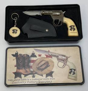 lot 99 image: Vintage JAMES BUTLER HICKOK Collectors Gun Shaped Knife and More in Original Tin (NIB)