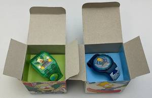 lot 110 image: Two Vintage SIMPSONS BartKrusty LCD Pocket Watches (NIB)