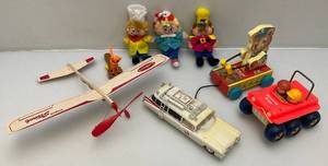 lot 186 image: Misc. Vintage Toys Including Bouncing Buggy, Fisher Price Tiny Teddy Xylphone Pull Toys, Snp,Crackel & Pop & More