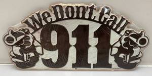 lot 206 image: We Dont Call 911 Tin Sign 6 38 x 13 34