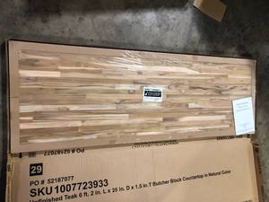 lot 10 image: Hampton Bay 6 ft. L x 25 in. D Unfinished Teak Solid Wood Butcher Block Countertop With Square Edge Customer Returns See Pictures