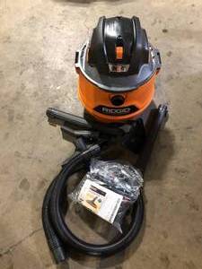 lot 11 image: RIDGID 14 Gallon 6.0 Peak HP NXT Shop Vacuum Wet Dry Vac with Fine Dust Filter, Locking Hose, Wands and Accessory Attachments  Customer Returns See Pictures