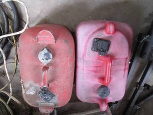 lot 75 image: Plastic and metal boat gas cans...