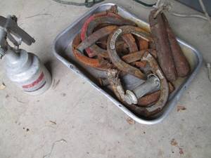 lot 91 image: Paint sprayers, metal horseshoes an...