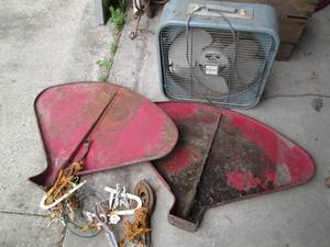 lot 98 image: Vintage clamshell tractor fenders, ...