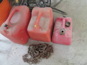 lot 207 image: Trio of plastic gas cans (some fuel...