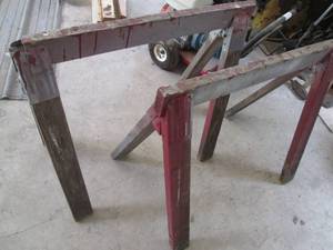 lot 211 image: Pair of wooden saw horses...