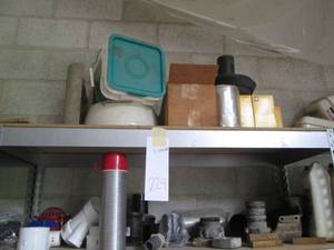 lot 224 image: Cat oil filters, Honda gas tank, mu...