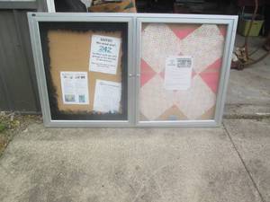 lot 101 image: Large bulletin board in locking enc...