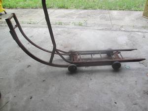lot 103 image: Antique Arcade Mfg stove dolly...