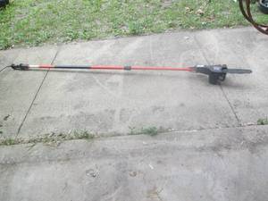 lot 126 image: Remington electric pole saw...