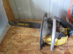 lot 152 image: Eager Beaver gas powered chainsaw...