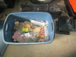 lot 167 image: Tote filled with wood shims, gloves and finishing material