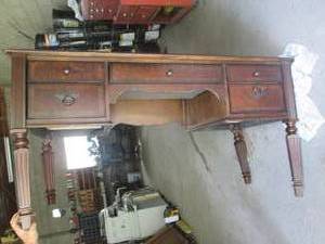 lot 6 image: Dark hardwood desk with Carved deta...