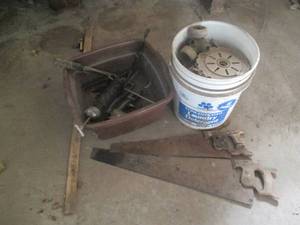 lot 19 image: Vintage hand saws, grease gun, and ...