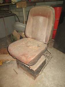 lot 268 image: Vintage seat with base and seat bel...