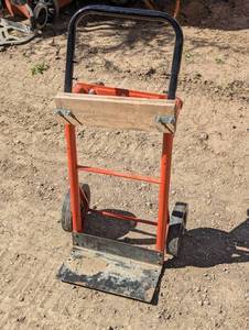 lot 51 image: Orange Dolly - board
