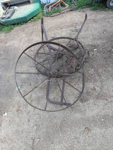 lot 83 image: 2 Large Metal Wheels with Attachments - Old Farm Equipment