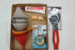 lot 267 image: NEW Oil Filter Pliers, Funnels and more
