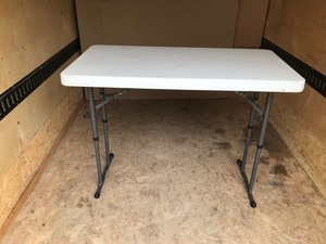 lot 21 image: Plastic Folding Table