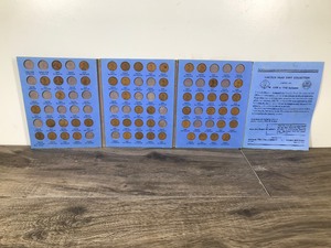 lot 215 image: Book of 55 Wheat Pennies