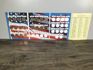 lot 217 image: Collectors Album of the United States of America Presidential One Dollar Coins - 20 Total