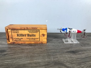 lot 227 image: Killer Baits fishing lure made by Rusty Jessee, patterned after the Heddon Style 100 series, featuring glass eyes and a patriotic Stars & Stripes Eagle design with TRUMP written on it