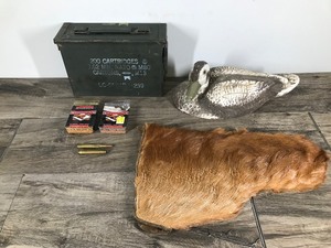 lot 260 image: Duck Decoy - Ammo Can - Copperhead BBs - 1 Glove that Appears to be made out of Bear Hide and More