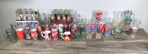 lot 285 image: Lot of Coca Cola Glasses, Mickey Mouse Coffee Mugs, Beverage Bottles and More
