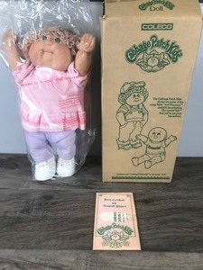 lot 311 image: Cabbage Patch Doll with Box, Birth Certificate and Adoption Papers
