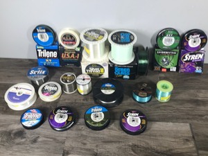 lot 322 image: 19 - Spools of Fishing Line Ranging from 10lb to 30 lb