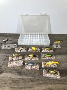 lot 382 image: Lot of 11 Collectible Fishing Lures and Rapala Plastic Tackle Box