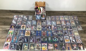 lot 409 image: Large Lot of Collectible Sports Cards - Basketball-Football & Baseball  Shohei Ohtani - Justin Jefferson - Jalen Green - Cee Dee Lamb - Spencer Steer - Patrick Ewing and More